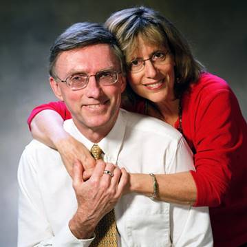 Barney Freiberg Dale & Eileen standing over their home care franchise